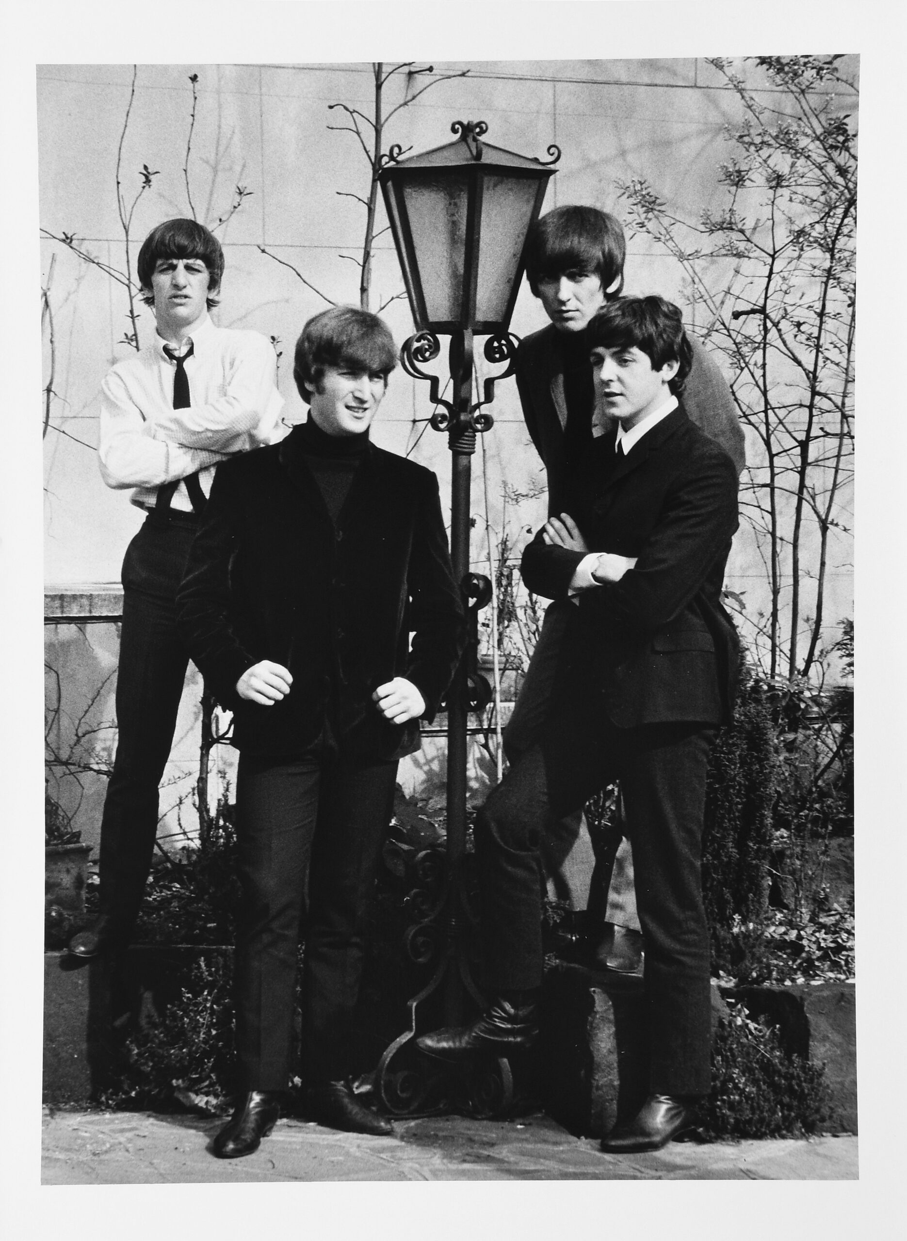 The Beatles in the walled garden of Les Ambassadeurs Club, Mayfair I by Lord Cristopher Thynne